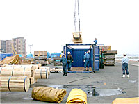 Packing steel-making rolls into a container for export